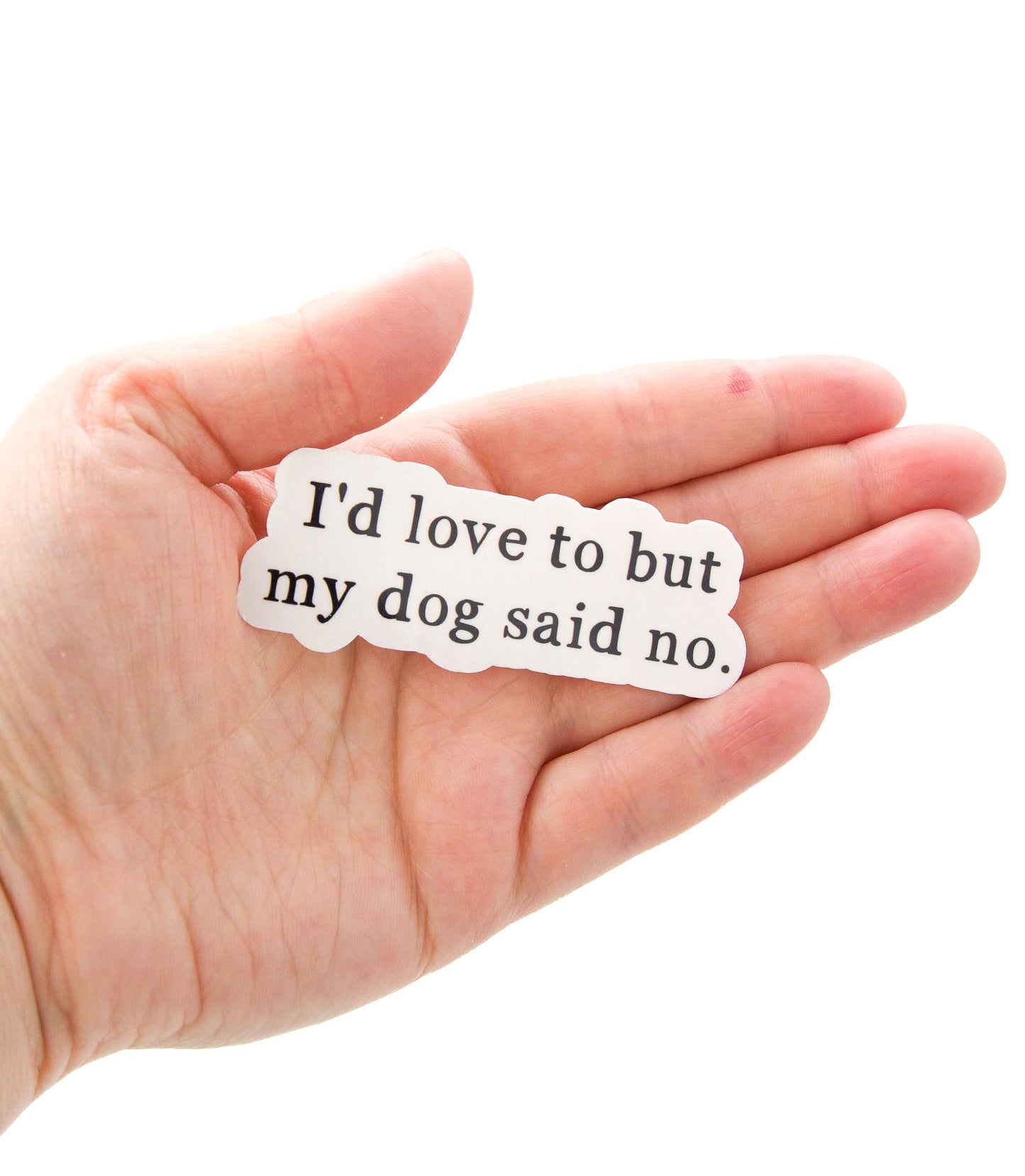 Käsinpainettu tarra, jossa lukee I'd love to but my dog said no