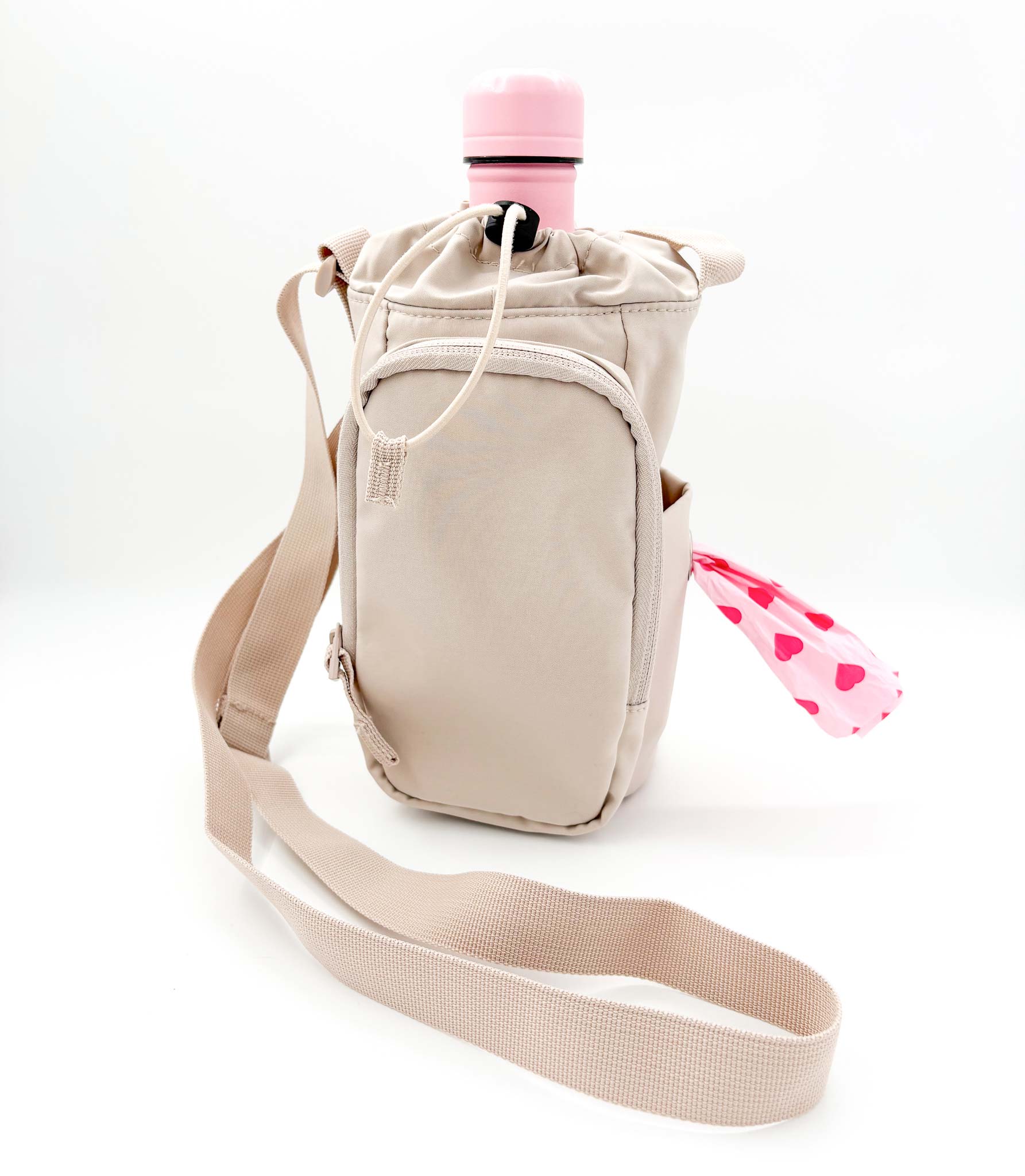 Koiranomistajan ulkoilulaukku eli dog walking bag värissä beige