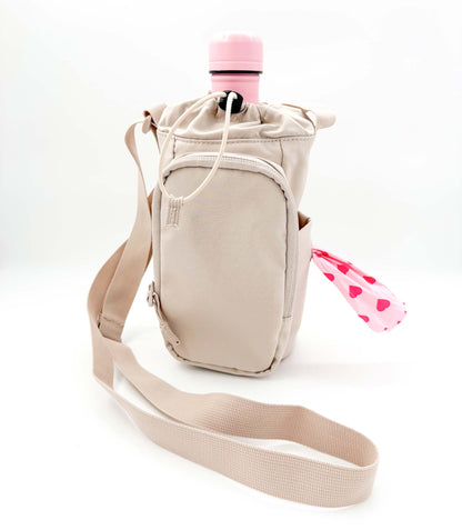Koiranomistajan ulkoilulaukku eli dog walking bag värissä beige