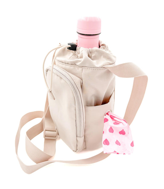 Koiranomistajan ulkoilulaukku eli dog walking bag värissä beige