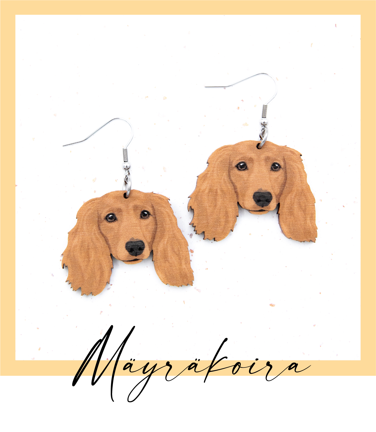 Suomalaisesta koivuvanerista ja kirurginteräksestä valmistetut roikkuvat punaiset pitkäkarvainen mäyräkoira korvakorut